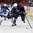KANATA, CANADA - APRIL 8: USA's Megan Bozek #9 skates with the puck while Finland's Karolina Rantamaki #29 chases her down during semifinal round action at the 2013 IIHF Ice Hockey Women's World Championship. (Photo by Andre Ringuette/HHOF-IIHF Images)